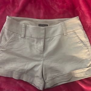 Lightly worn tan/beige Express shorts. Size 4